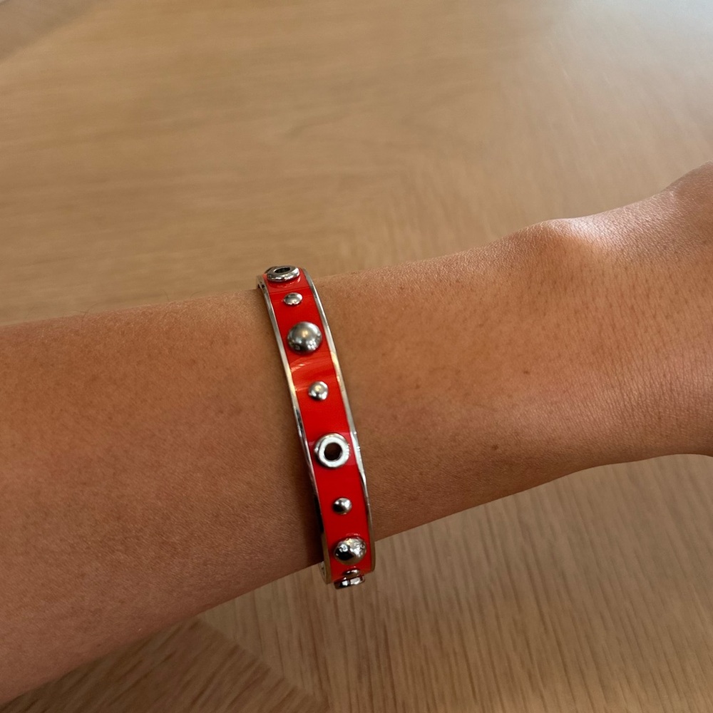 Coach Enamel Grommets and Rivets Coral Bangle